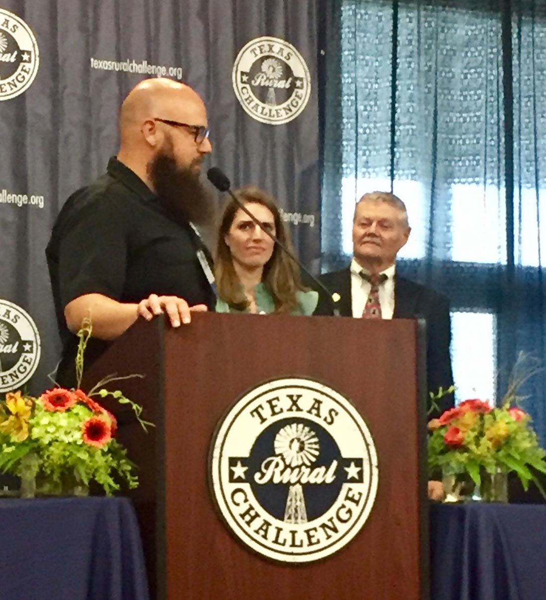 Speaker at the Texas Rural Challenge podium