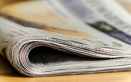 Newspaper on tabletop
