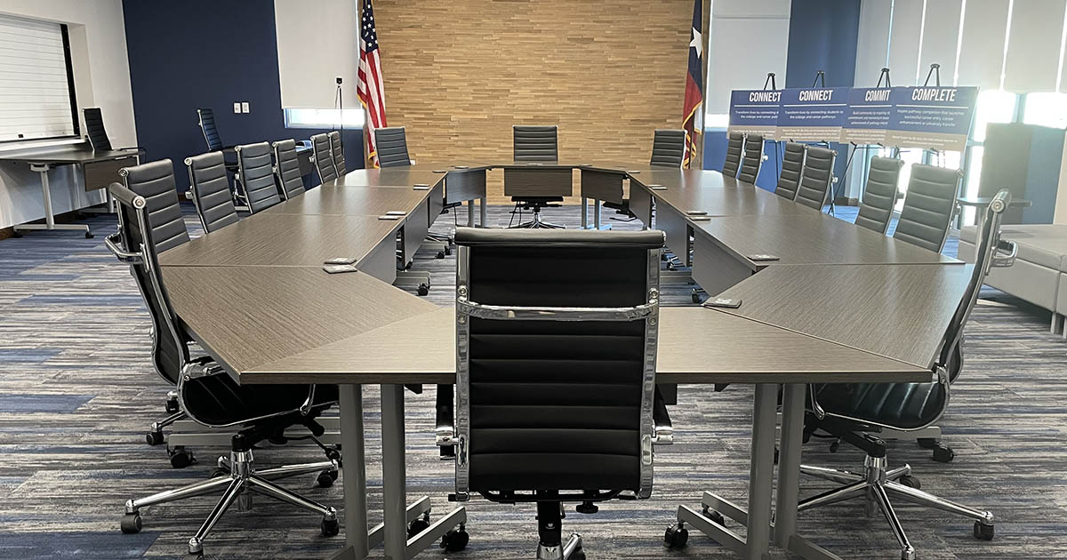 Grayson College board room featuring view of entire table and empty seats