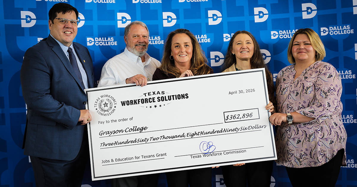 Grayson College staff holding up Jet Grant check for $362,896.