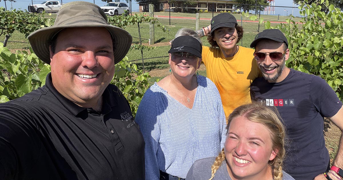 Members of C R E A posing with Grayson College Students in Vineyard