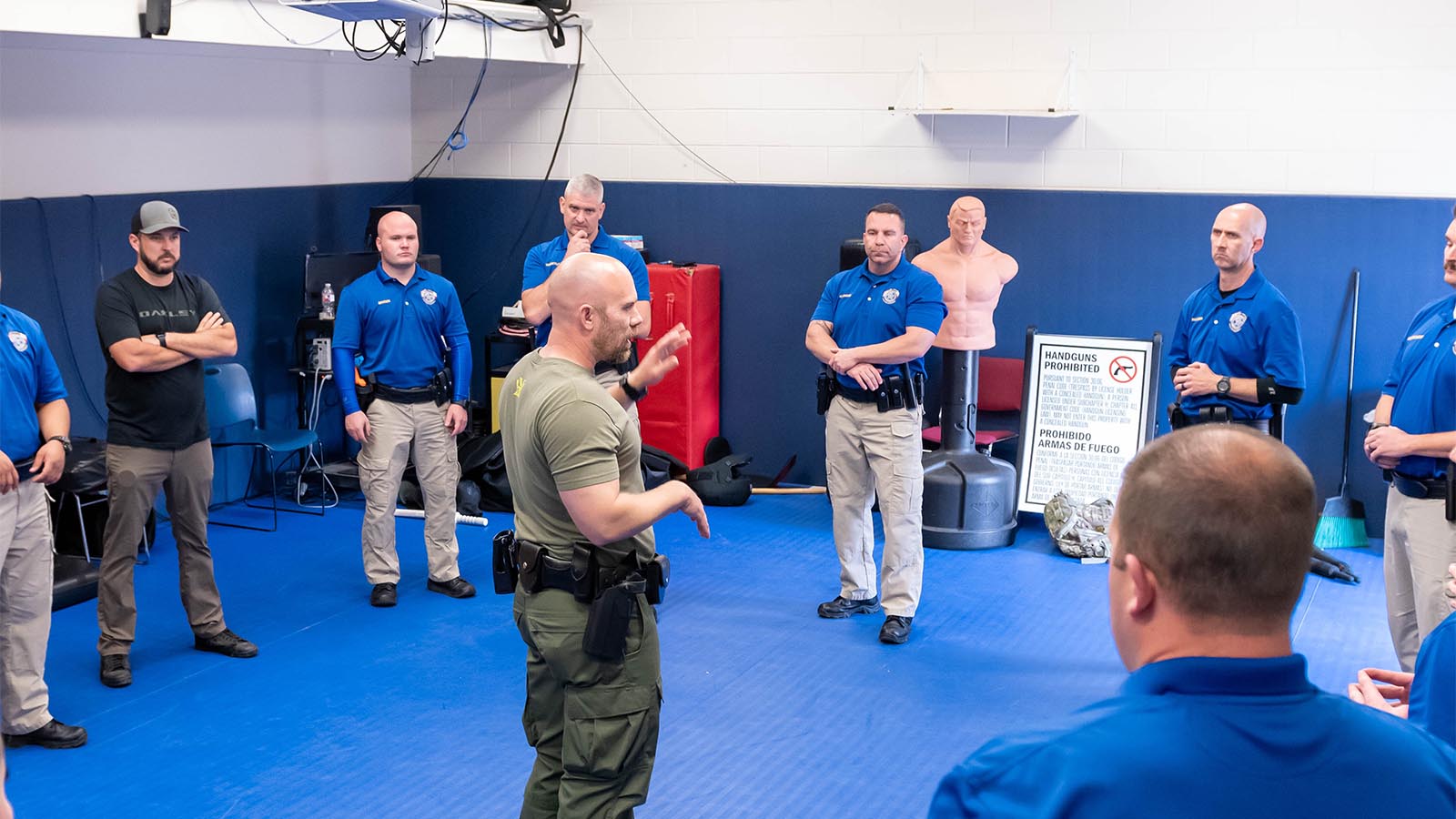 Texas Regional Police Academy cadets training in circle around instructor